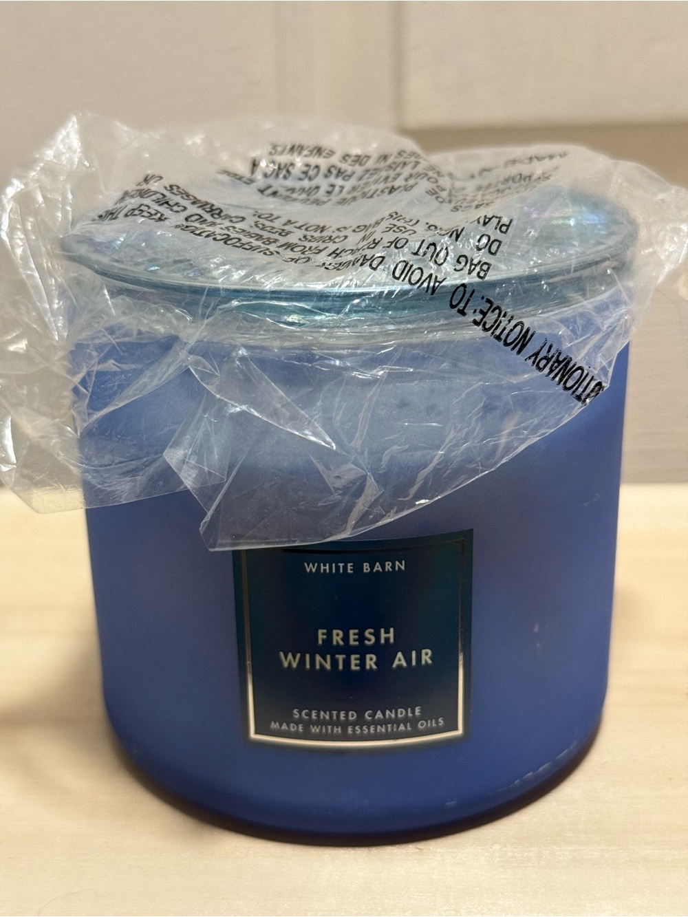 White Barn Fresh Winter Air 3 wick candle. Blue glass jar and lid